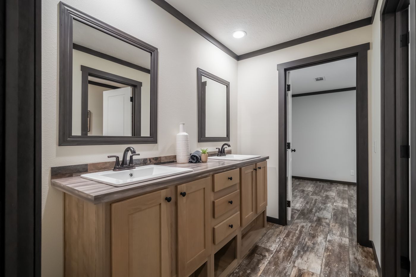 The BOUJEE LUX Exterior. This Manufactured Mobile Home features 4 bedrooms and 3 baths.