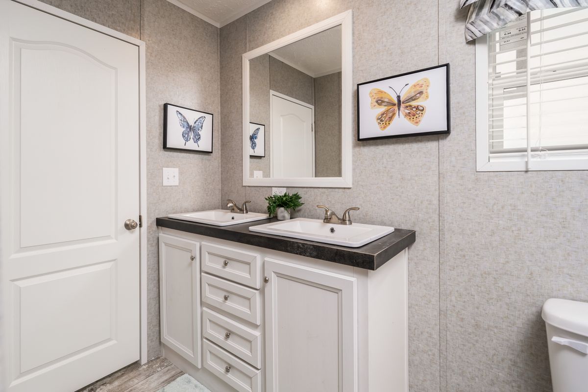 The BENJAMIN Exterior. This Manufactured Mobile Home features 3 bedrooms and 2 baths.