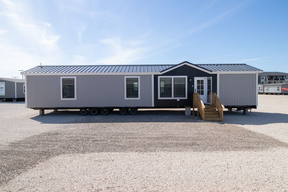 The LEVI Exterior. This Manufactured Mobile Home features 2 bedrooms and 2 baths.