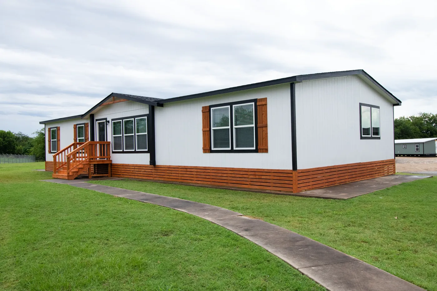 The ODYSSEY Exterior. This Manufactured Mobile Home features 4 bedrooms and 2 baths.