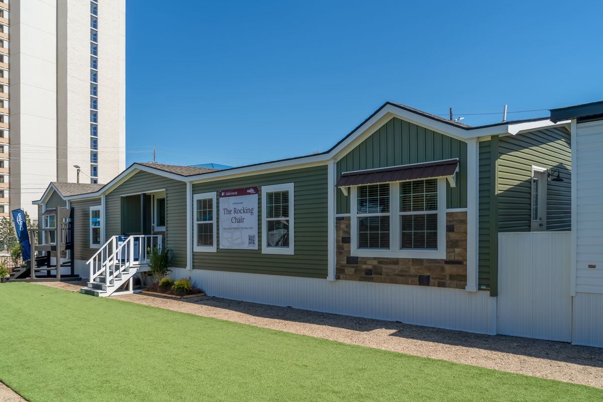 The THE ROCKING CHAIR Exterior. This Manufactured Mobile Home features 3 bedrooms and 2 baths.