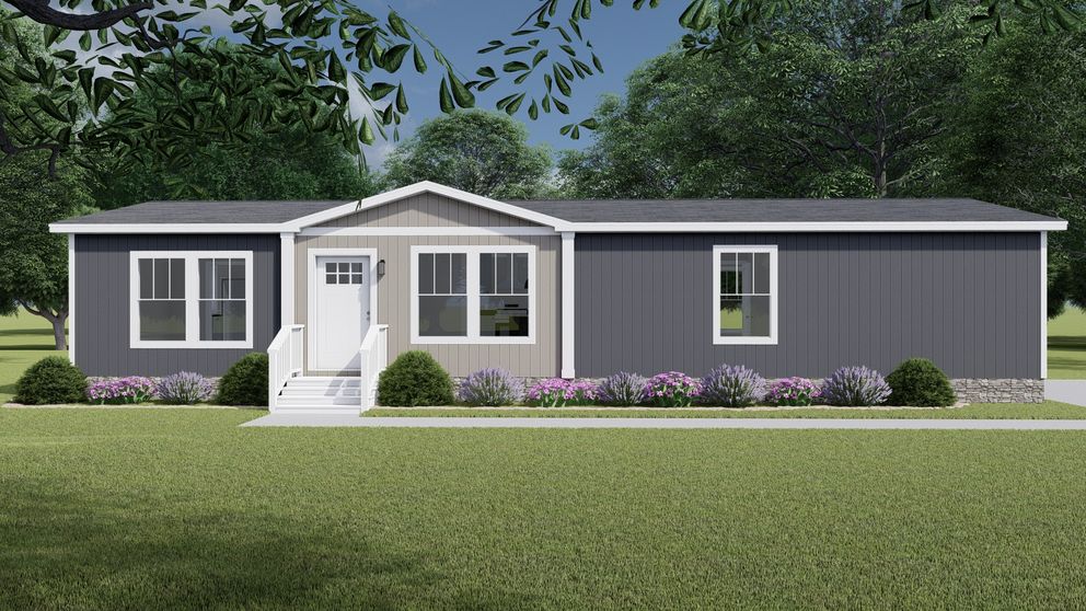 The LET IT BE Exterior. This Manufactured Mobile Home features 3 bedrooms and 2 baths.
