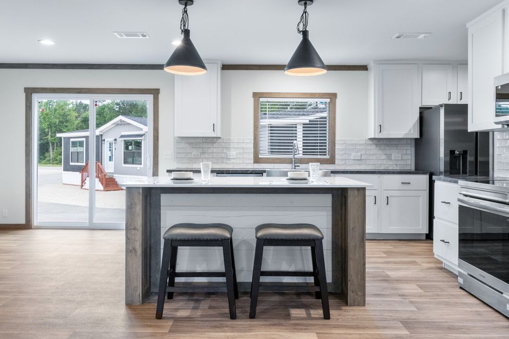 The EMILIE ELITE Exterior. This Manufactured Mobile Home features 3 bedrooms and 2 baths.