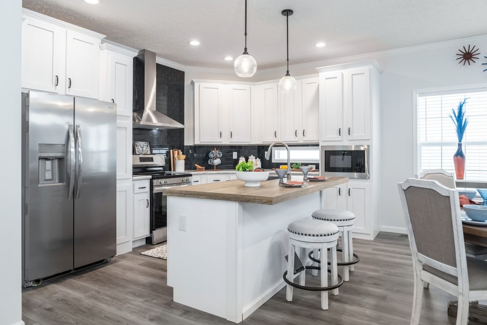 The 1447 CAROLINA Exterior. This Manufactured Mobile Home features 3 bedrooms and 2 baths.