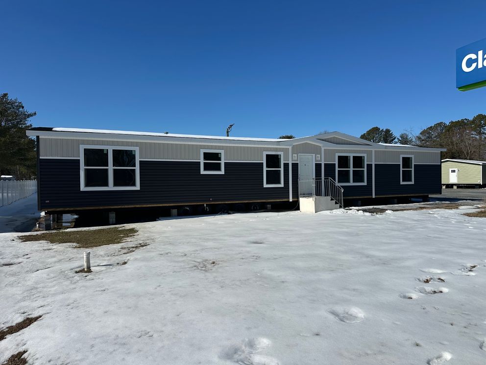 The EMERALD 7228-643 Exterior. This Manufactured Mobile Home features 4 bedrooms and 2 baths.