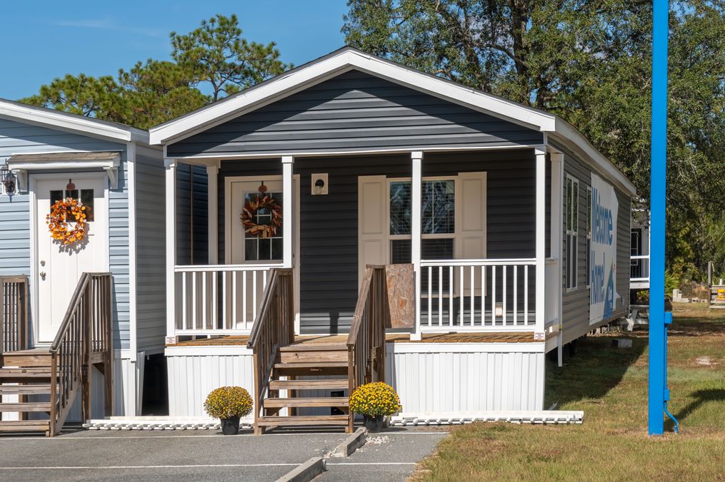 The 4200 "SOUTHPORT" 58'4X16 Exterior. This Manufactured Mobile Home features 2 bedrooms and 2 baths.