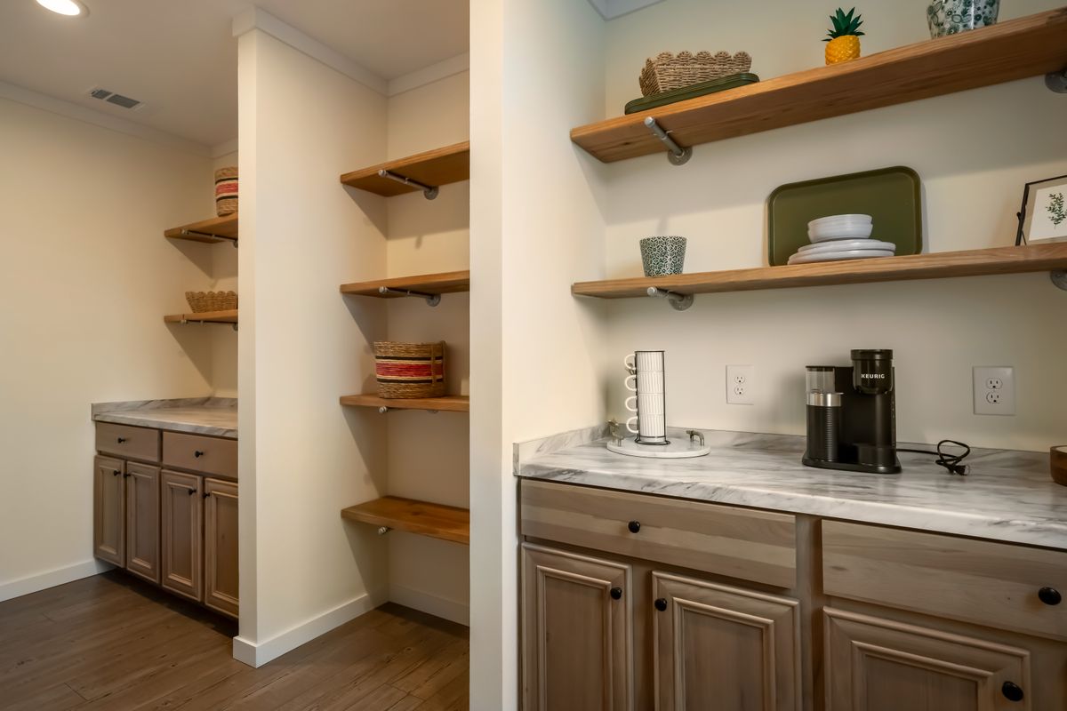 The THE ROCKING CHAIR Exterior. This Manufactured Mobile Home features 3 bedrooms and 2 baths.