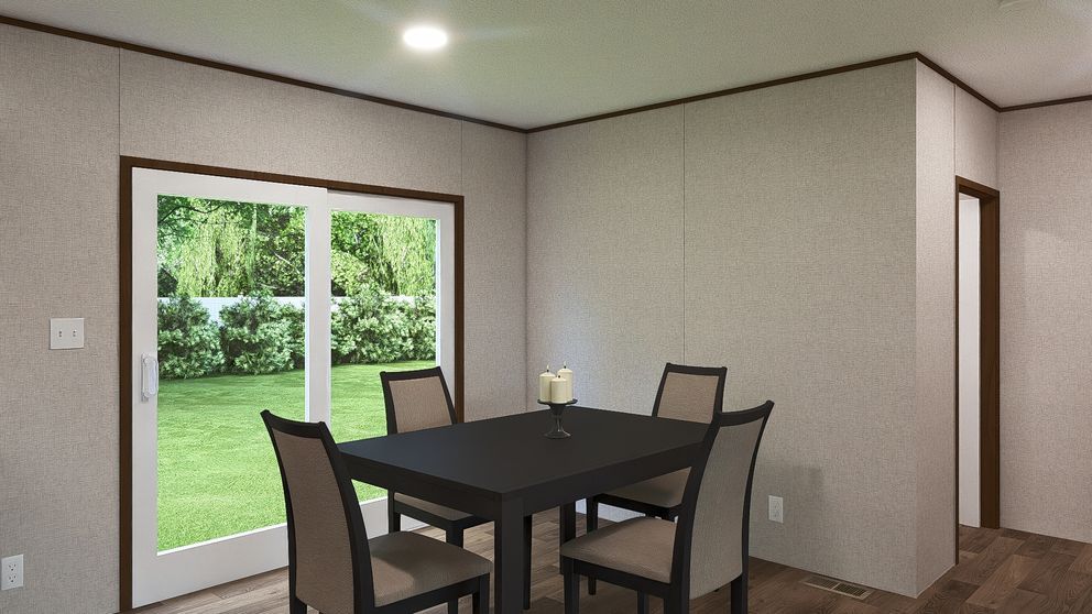 The SPRUCE Exterior. This Manufactured Mobile Home features 3 bedrooms and 2 baths.