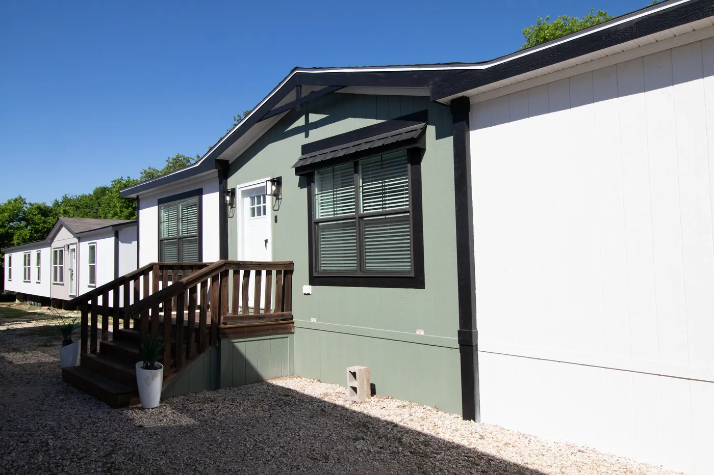 The FARM 4 FLEX ELITE Exterior. This Manufactured Mobile Home features 4 bedrooms and 3 baths.