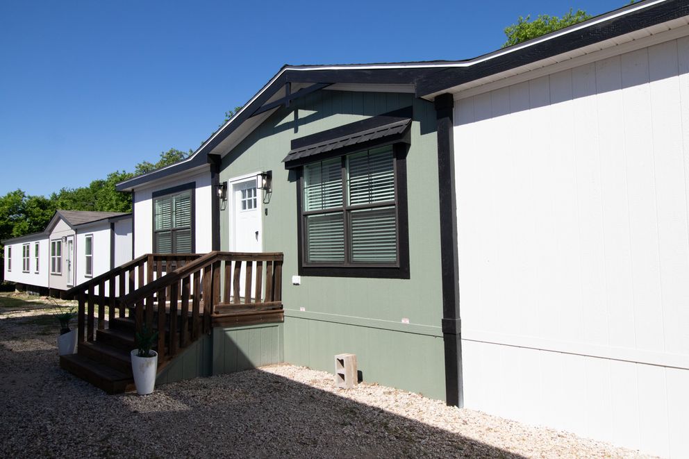 The FARM 4 FLEX ELITE Exterior. This Manufactured Mobile Home features 4 bedrooms and 3 baths.