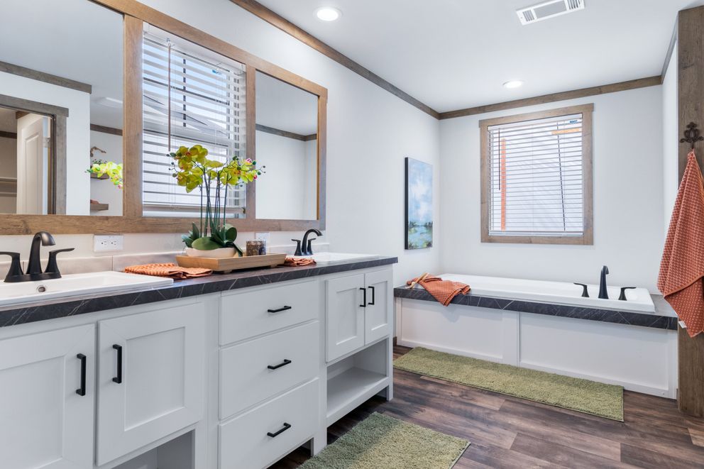 The FARM 3 FLEX ELITE DEN Exterior. This Manufactured Mobile Home features 3 bedrooms and 2 baths.