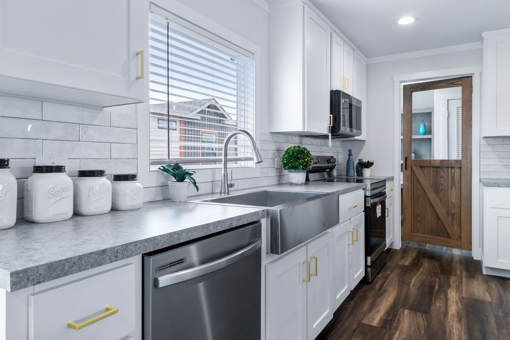 The LIZZIE Exterior. This Manufactured Mobile Home features 3 bedrooms and 2 baths.
