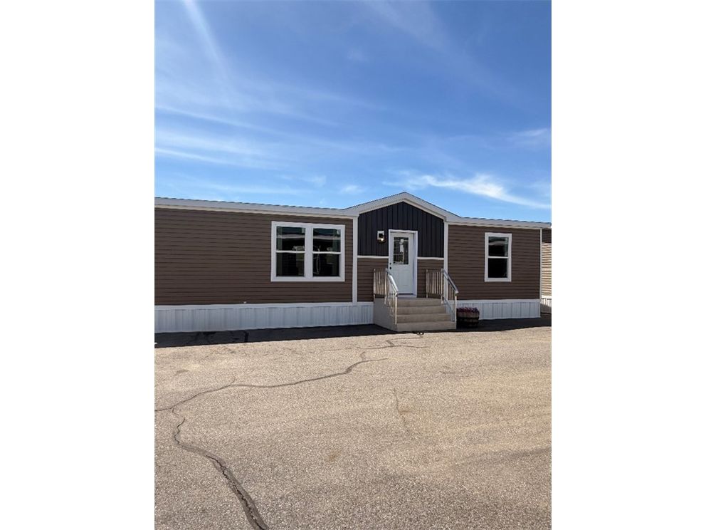 The APATITE Exterior. This Manufactured Mobile Home features 3 bedrooms and 2 baths.