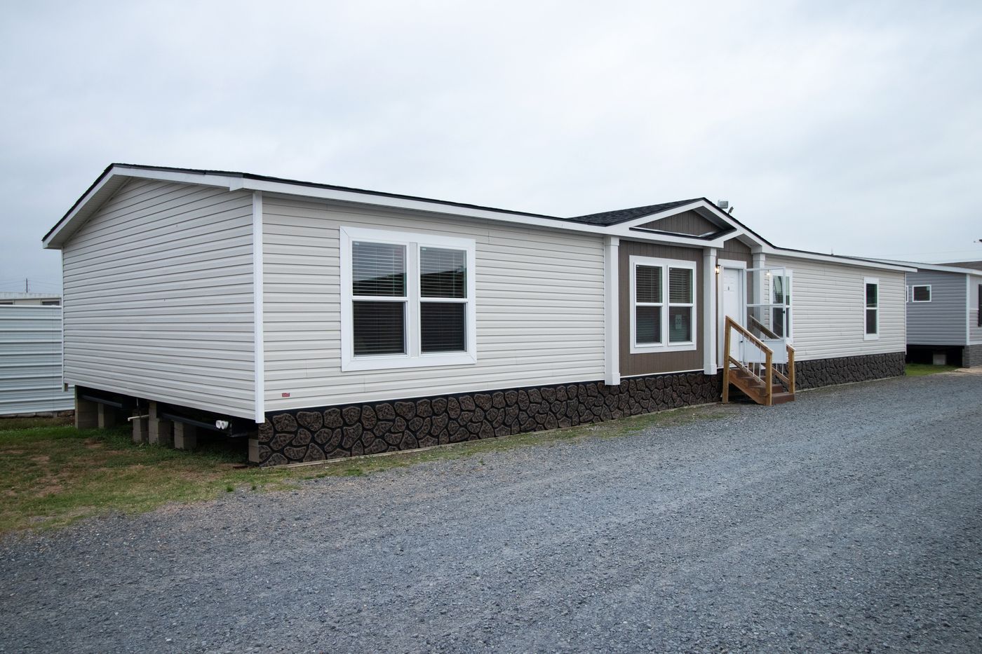 The THE CHOICE Exterior. This Manufactured Mobile Home features 4 bedrooms and 2 baths.