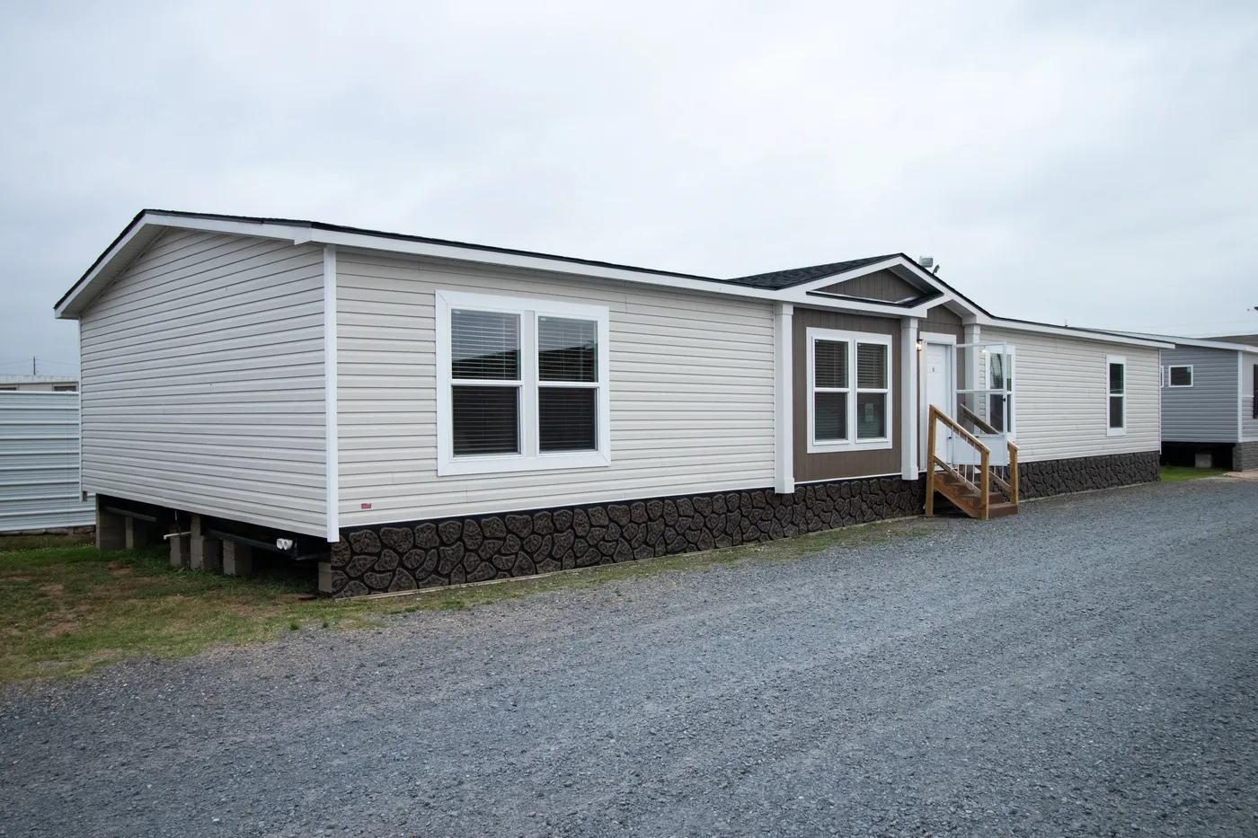 The THE CHOICE Exterior. This Manufactured Mobile Home features 4 bedrooms and 2 baths.