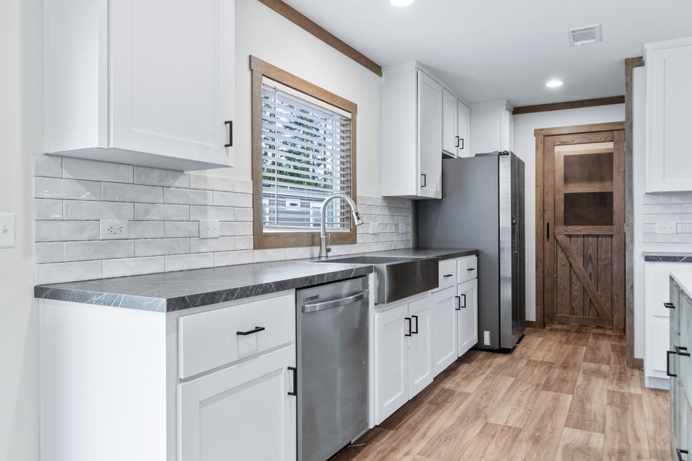 The EMILIE ELITE Exterior. This Manufactured Mobile Home features 3 bedrooms and 2 baths.