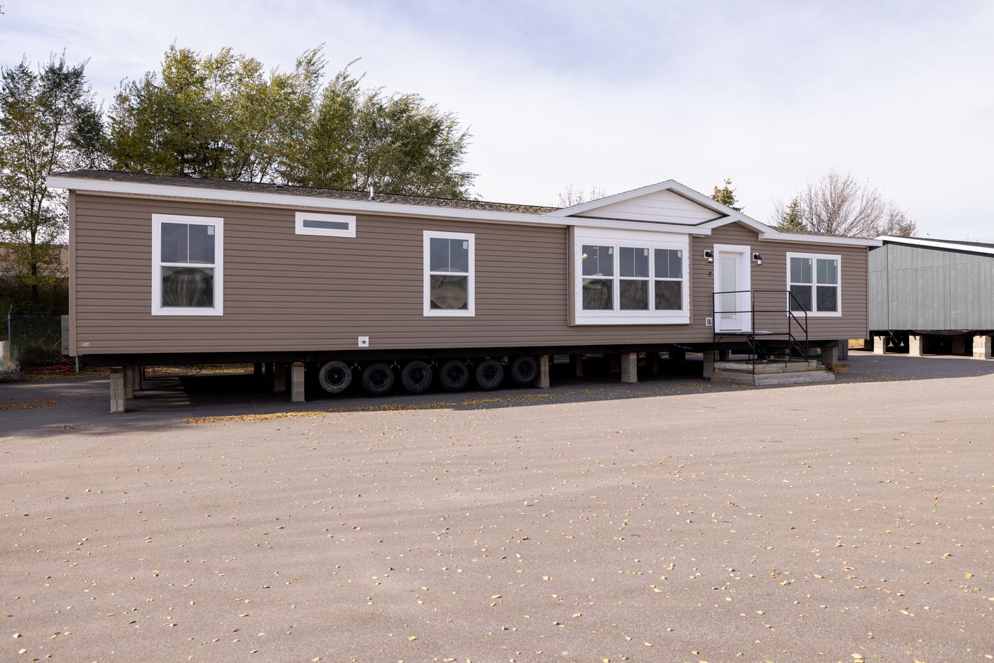 The LEGACY 327 Exterior. This Manufactured Mobile Home features 3 bedrooms and 2 baths.