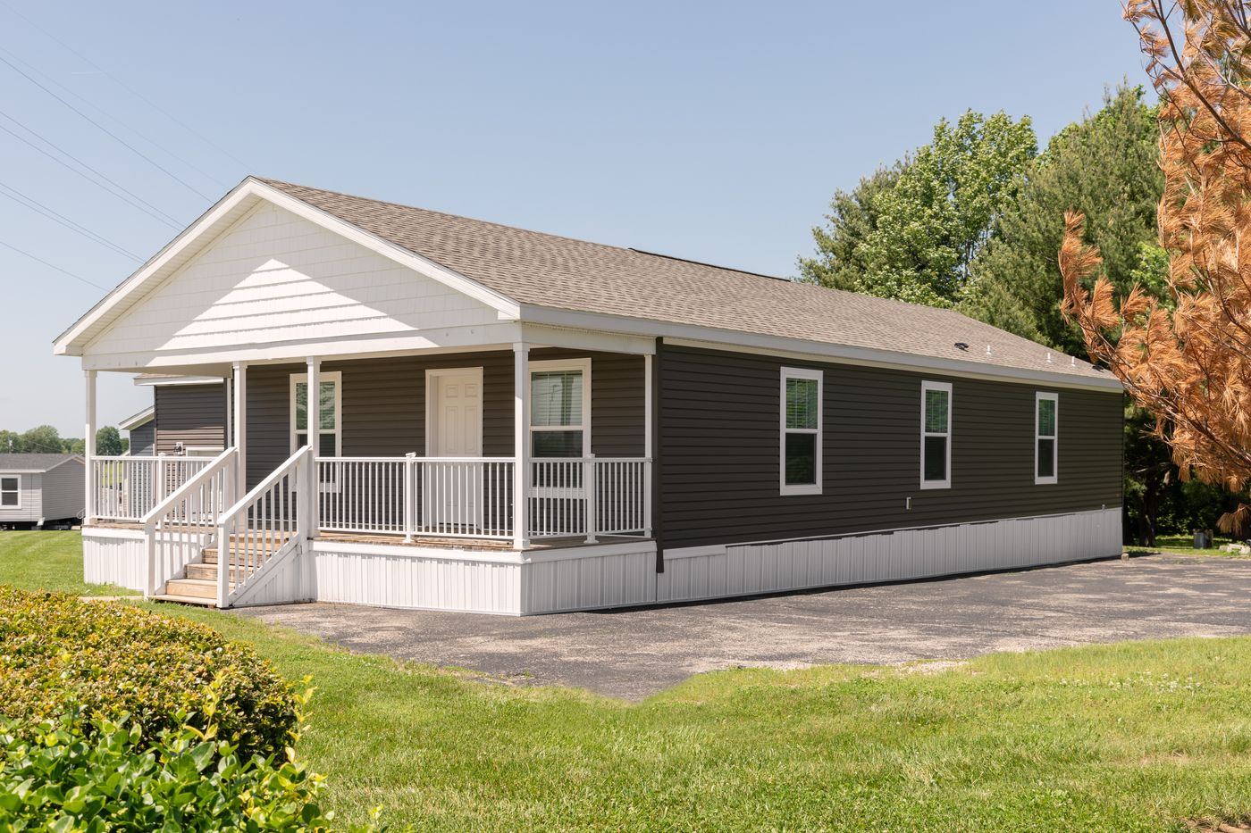 The CENTER ST/5228-MS014-1 SECT Exterior. This Manufactured Mobile Home features 3 bedrooms and 2 baths.