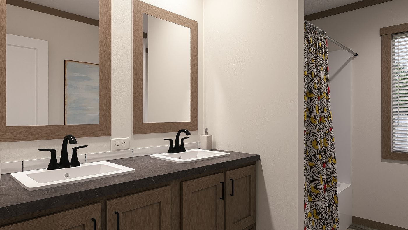 The NELLIE ELITE Exterior. This Manufactured Mobile Home features 4 bedrooms and 2 baths.