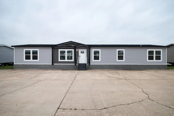 The HERCULES Exterior. This Manufactured Mobile Home features 4 bedrooms and 2 baths.
