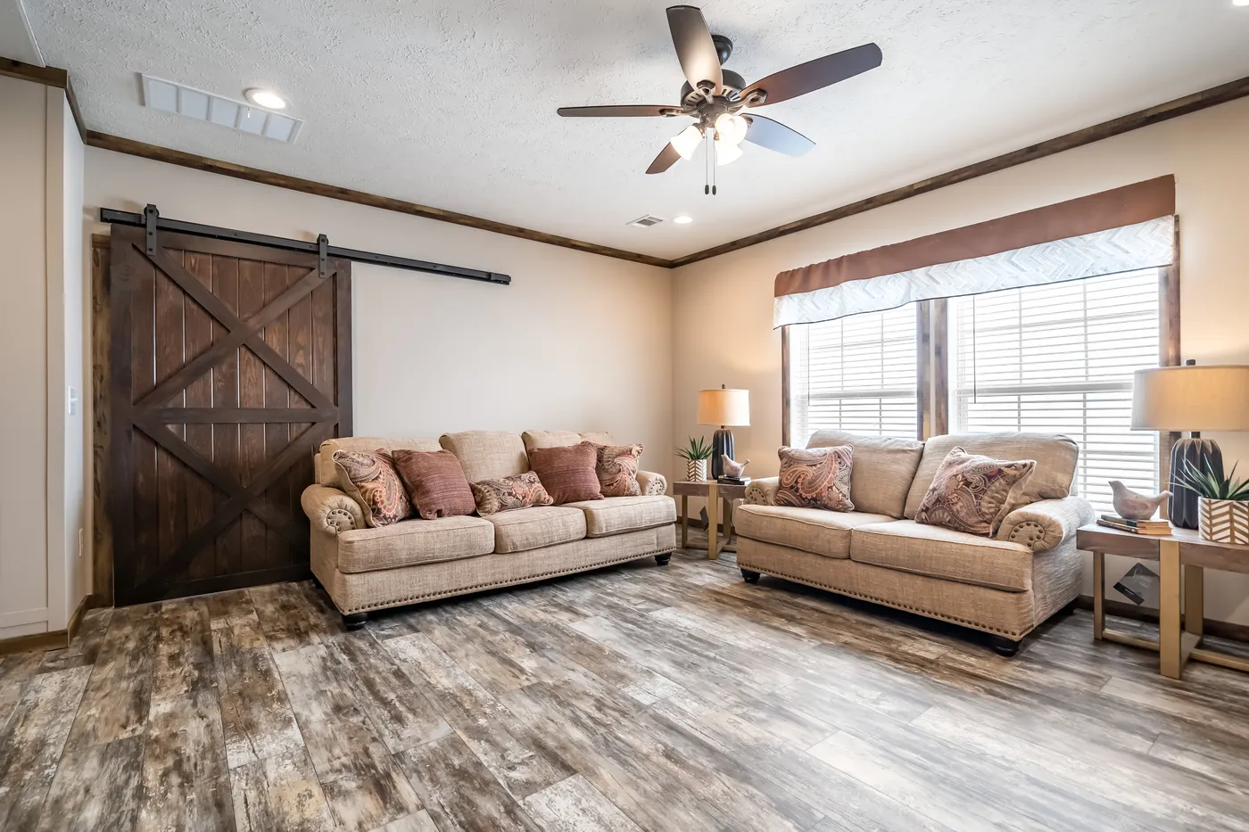 The THE TYRA Exterior. This Manufactured Mobile Home features 4 bedrooms and 2 baths.