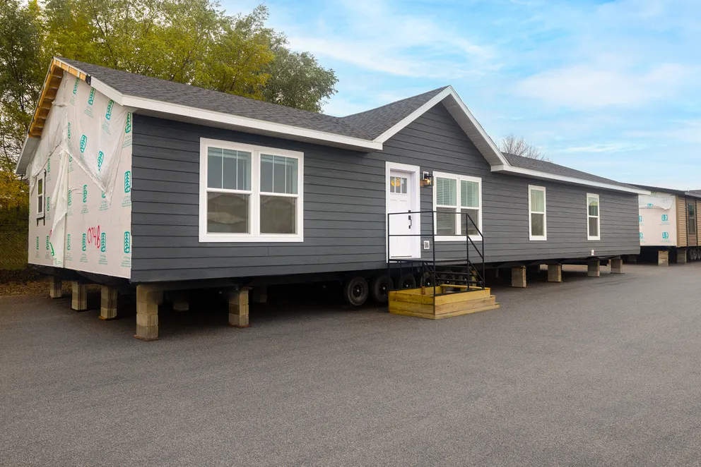 The HEY JUDE Exterior. This Manufactured Mobile Home features 4 bedrooms and 2 baths.
