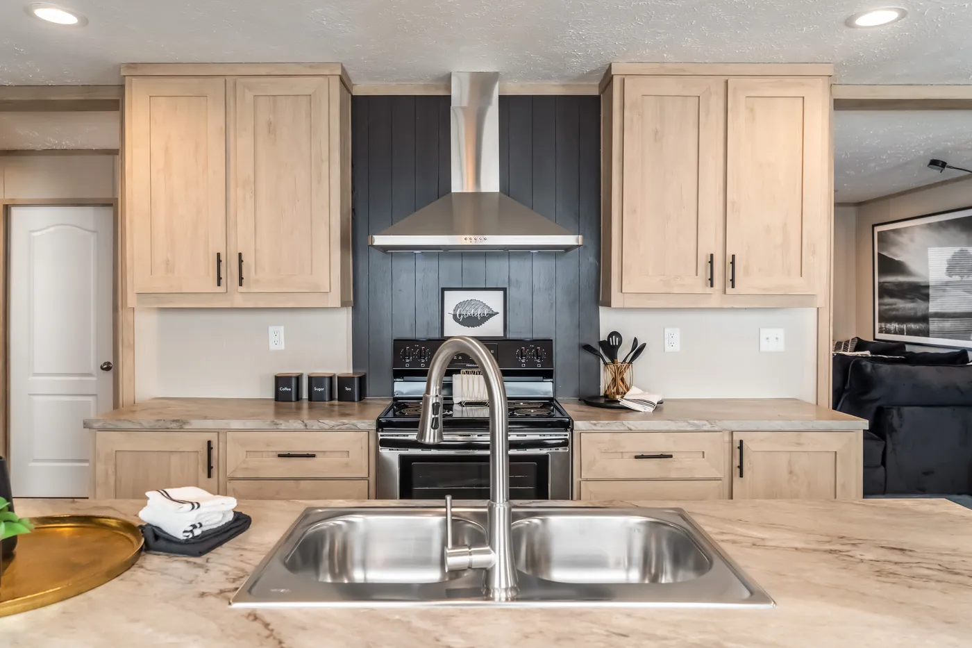 The RAINIER Exterior. This Manufactured Mobile Home features 4 bedrooms and 3 baths.