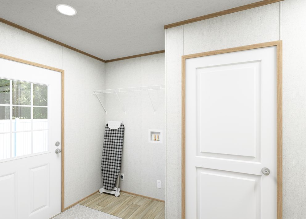 The ASPIRE Exterior. This Manufactured Mobile Home features 3 bedrooms and 2 baths.