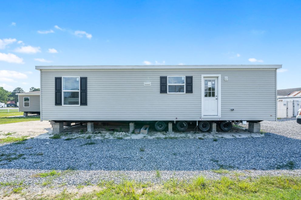The ZIRCON Exterior. This Manufactured Mobile Home features 3 bedrooms and 2 baths.