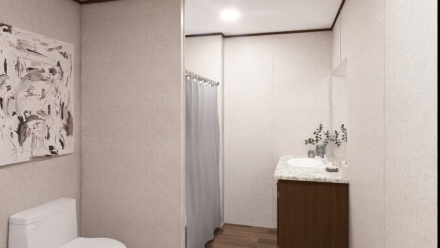 The MAPLE Exterior. This Manufactured Mobile Home features 3 bedrooms and 2 baths.