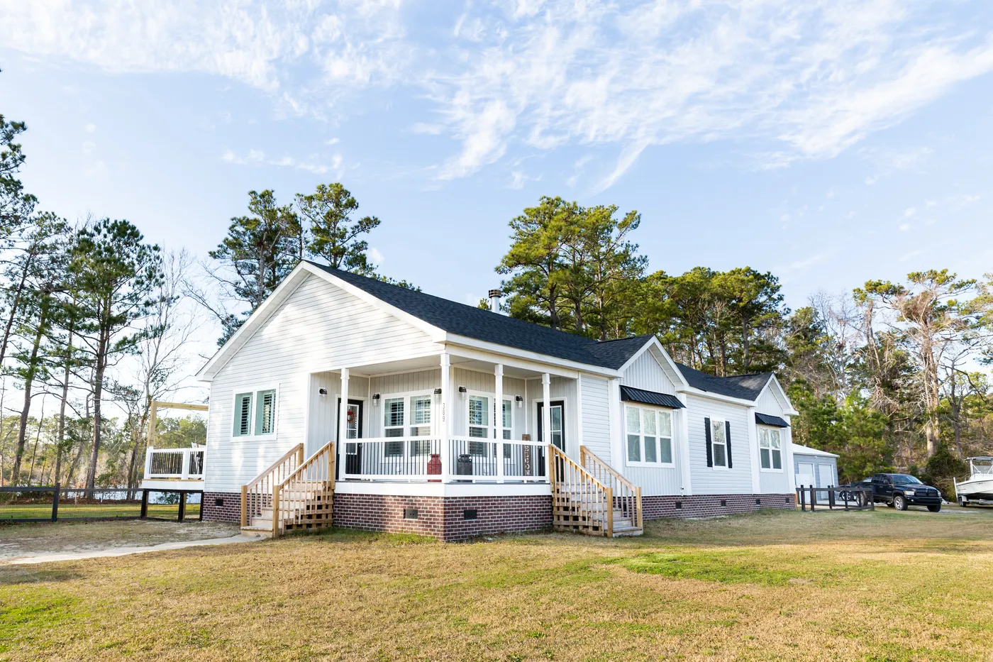 The 1434 CAROLINA "SOUTHERN BELLE" Exterior. This Manufactured Mobile Home features 3 bedrooms and 2 baths.