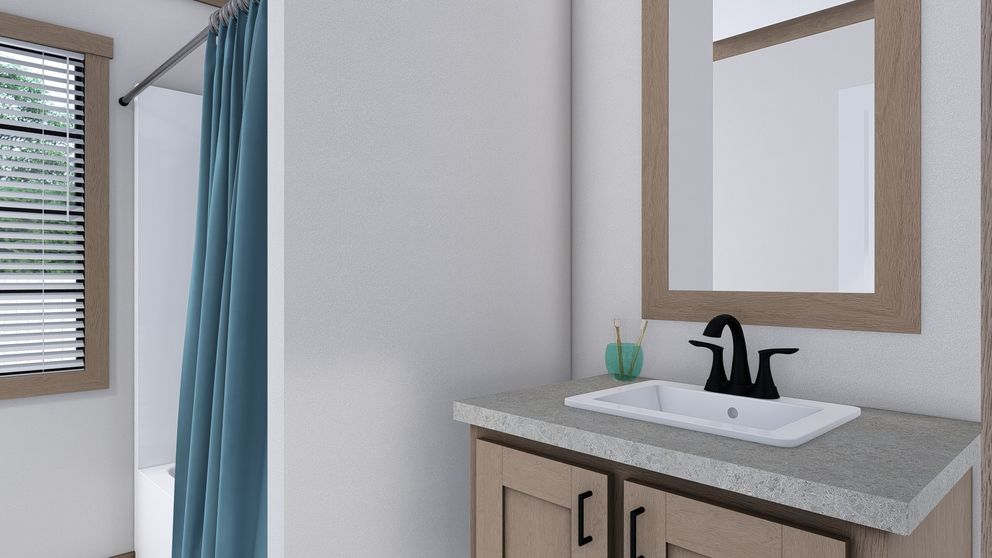 The THE ANGELINA Exterior. This Manufactured Mobile Home features 4 bedrooms and 2 baths.