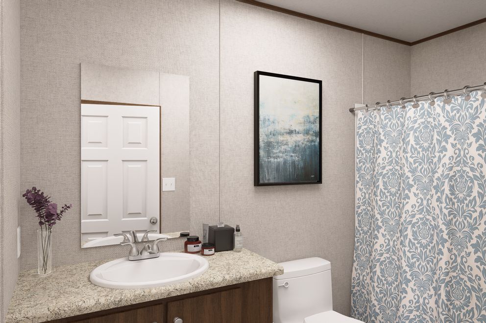 The DOGWOOD Exterior. This Manufactured Mobile Home features 2 bedrooms and 2 baths.