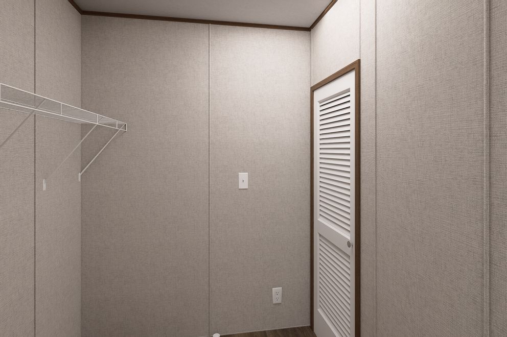 The MAGNOLIA Exterior. This Manufactured Mobile Home features 3 bedrooms and 2 baths.