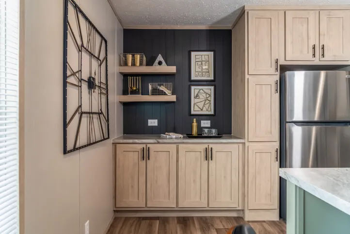 The RAINIER Exterior. This Manufactured Mobile Home features 4 bedrooms and 3 baths.