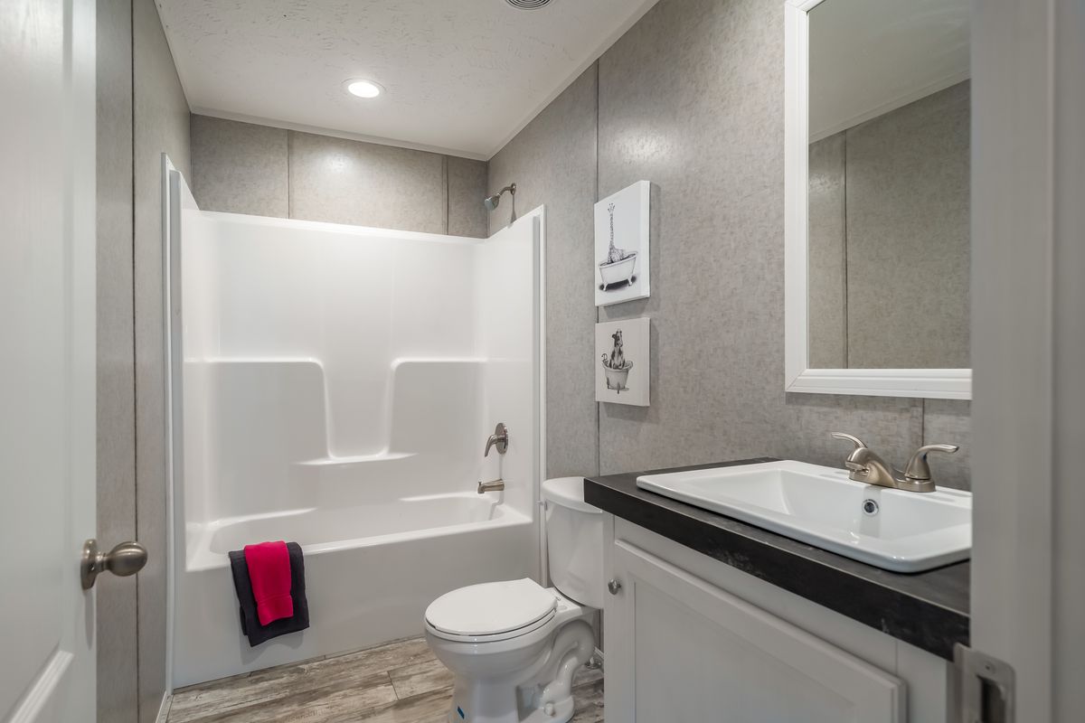 The BENJAMIN Exterior. This Manufactured Mobile Home features 3 bedrooms and 2 baths.