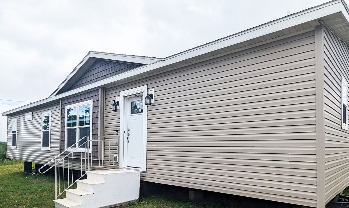 The LEGACY 377 Exterior. This Manufactured Mobile Home features 3 bedrooms and 2 baths.
