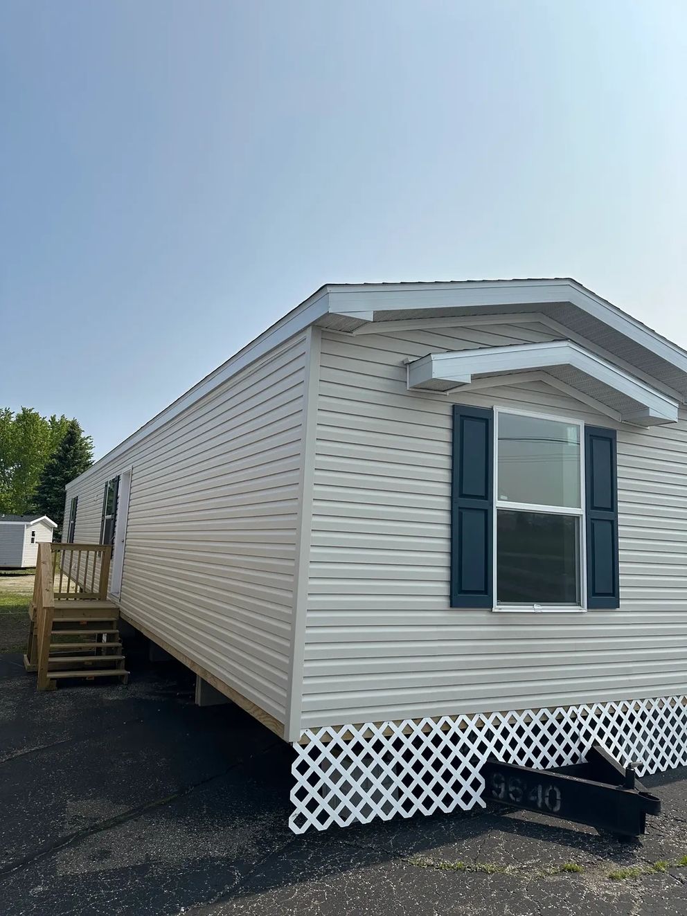 The TOPAZ Exterior. This Manufactured Mobile Home features 3 bedrooms and 2 baths.