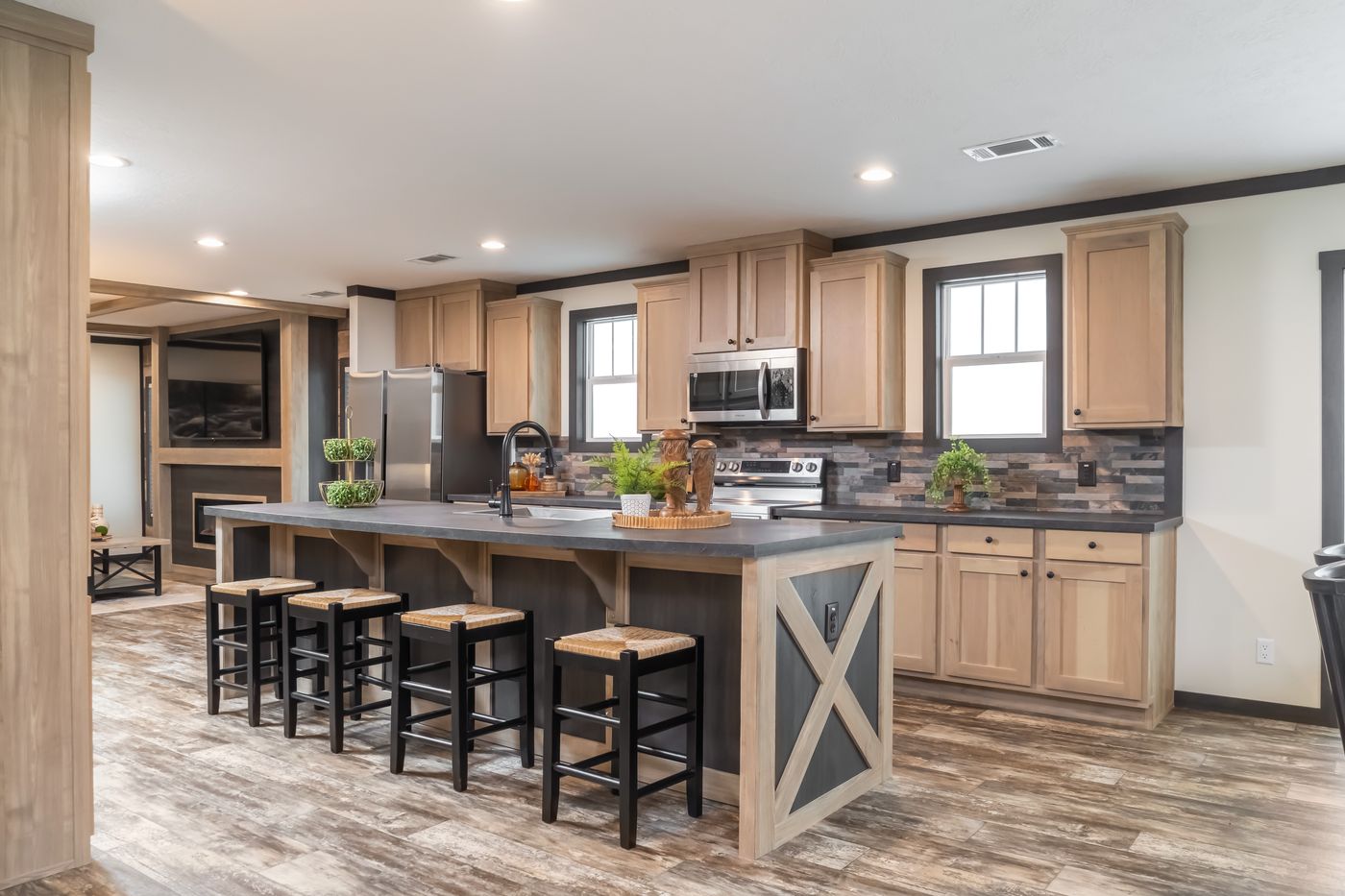 The BOUJEE LUX Exterior. This Manufactured Mobile Home features 4 bedrooms and 3 baths.