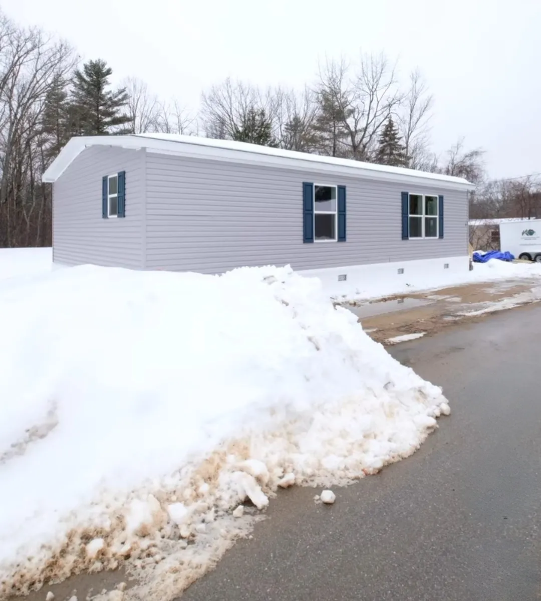 The TURQUOISE Exterior. This Manufactured Mobile Home features 2 bedrooms and 2 baths.