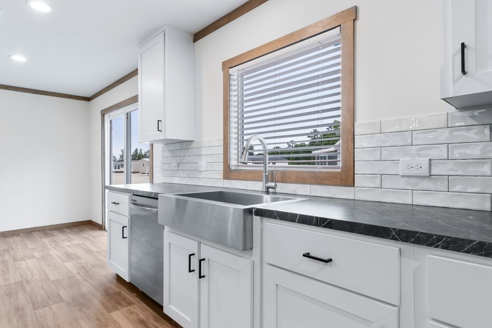 The EMILIE ELITE Exterior. This Manufactured Mobile Home features 3 bedrooms and 2 baths.