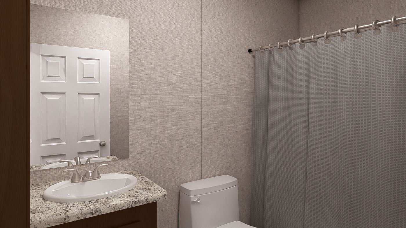 The MAPLE Exterior. This Manufactured Mobile Home features 3 bedrooms and 2 baths.