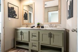 The RAINIER Exterior. This Manufactured Mobile Home features 4 bedrooms and 3 baths.