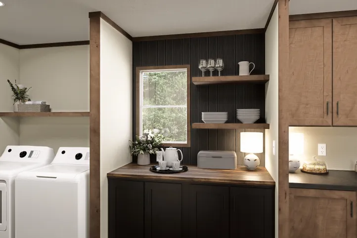 The BOONE Exterior. This Manufactured Mobile Home features 4 bedrooms and 2 baths.