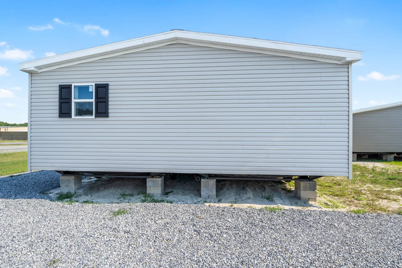 The ZIRCON Exterior. This Manufactured Mobile Home features 3 bedrooms and 2 baths.