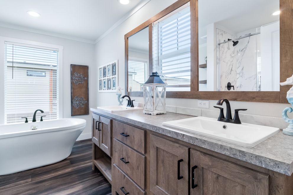 The LIZZIE Exterior. This Manufactured Mobile Home features 3 bedrooms and 2 baths.