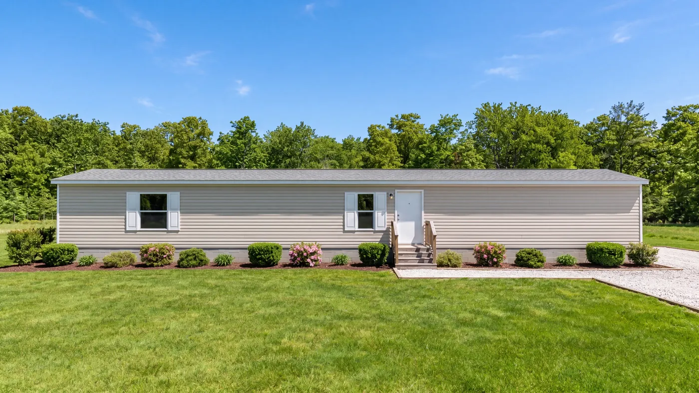 The MAGNOLIA Exterior. This Manufactured Mobile Home features 3 bedrooms and 2 baths.
