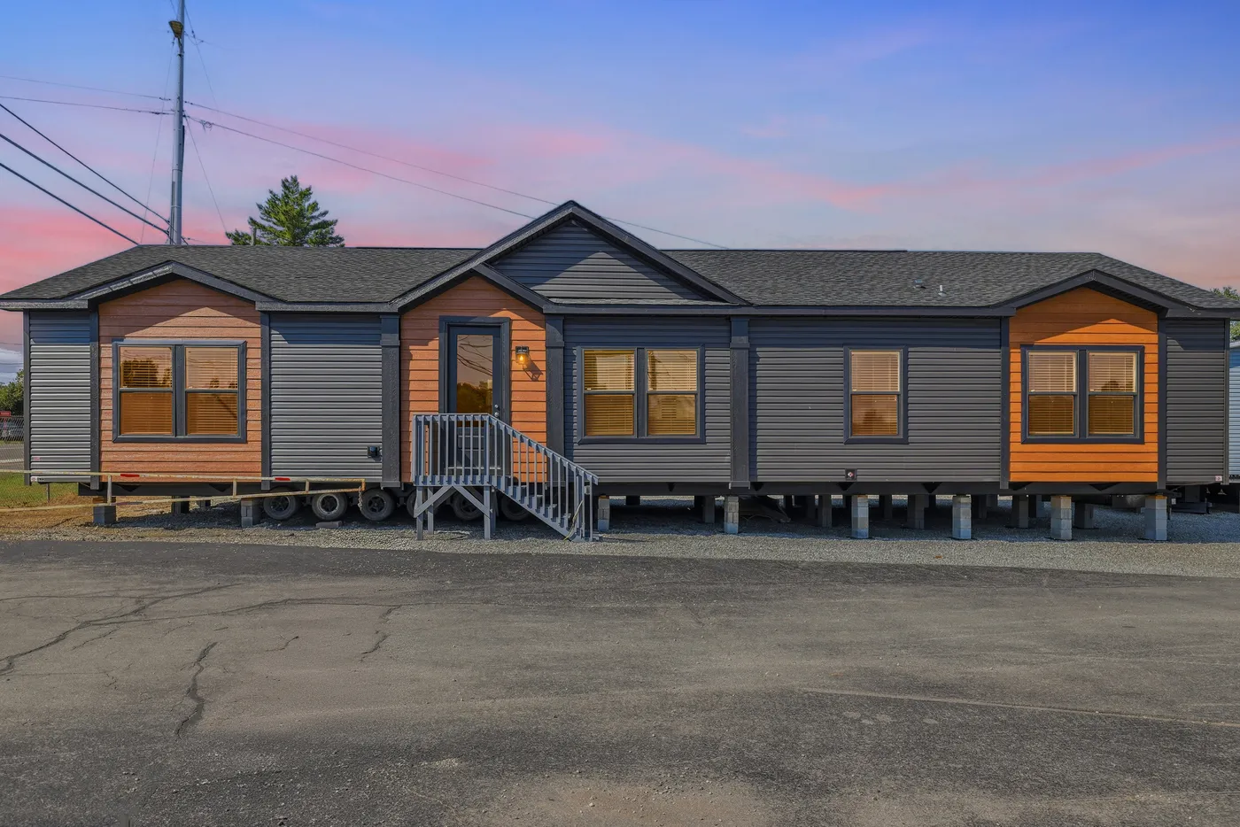 The SUPER 68 ELITE Exterior. This Manufactured Mobile Home features 3 bedrooms and 2 baths.