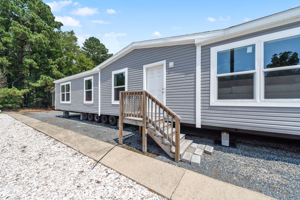 The SWEET BREEZE 64 Exterior. This Manufactured Mobile Home features 3 bedrooms and 2 baths.