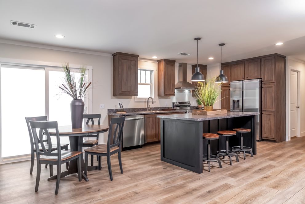 The LEAN ON ME Exterior. This Manufactured Mobile Home features 3 bedrooms and 2 baths.